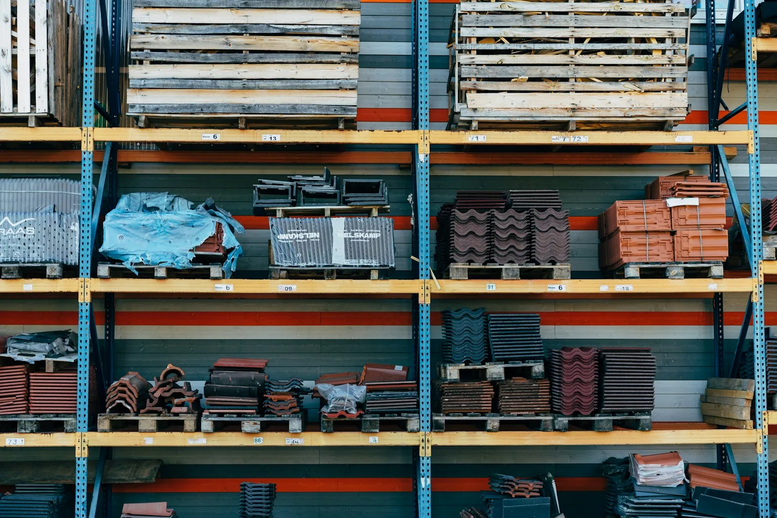 Building materials stocked on warehouse shelves